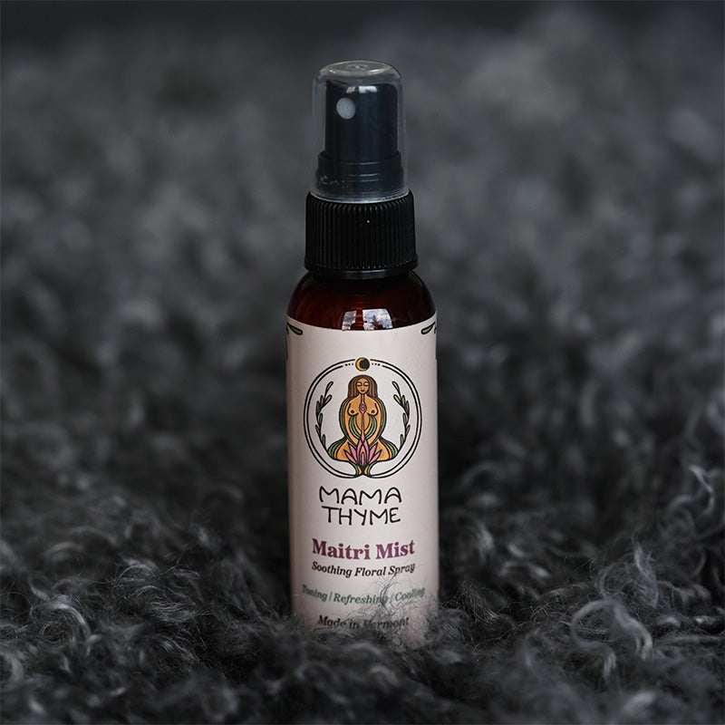 A spray bottle of Maitri Mist organic rose hydrosol spray.